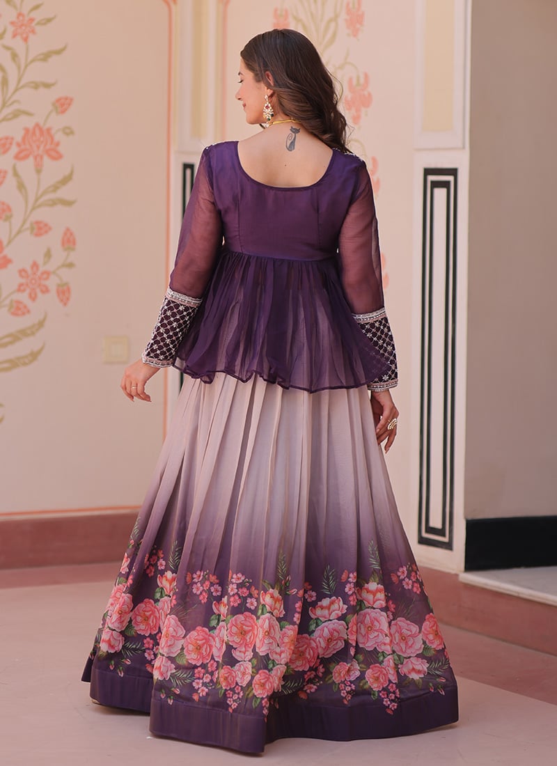 Blush Georgette Embroidered Choli With African Print Dupion Silk Ruffled Skirt And Baby Pink Dupatta main image 0