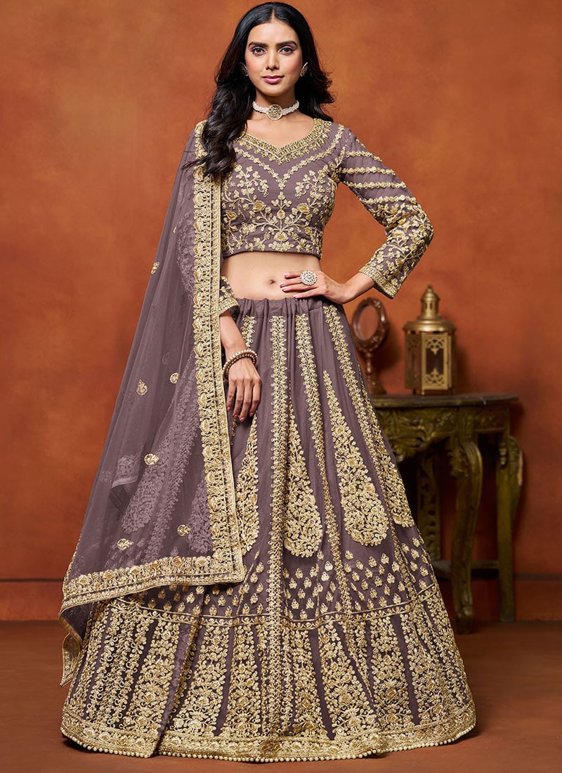 Purple Net Embroidered Sequins Elegant Lehenga Wedding Wear