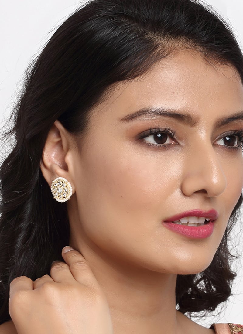 Radiant Gold Plated Kundan Studs Adorned With White Stones And White Beads Party Wear