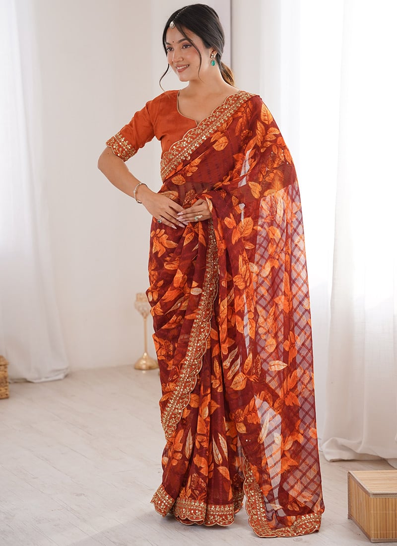 Radiant Orange Georgette Embroidered Sequins Floral Print Saree After Six Wear