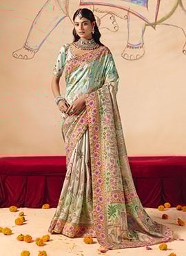 Radiant Sky Blue Dola Silk Zari Embroidered Sequins Cut Work Jacquard Print Saree