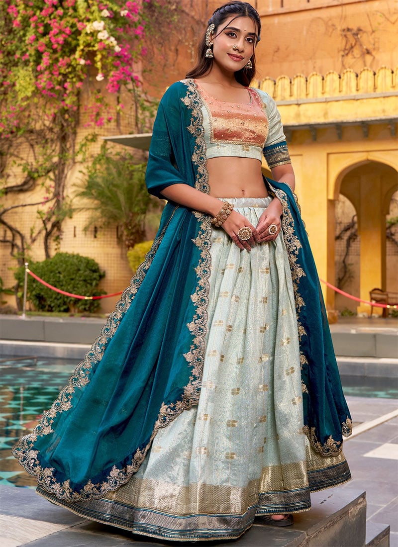 Radiant Teal Slub Kota Silk Zari Weaving Work With Paithani Border Fish Cut Lehenga Festive Wear