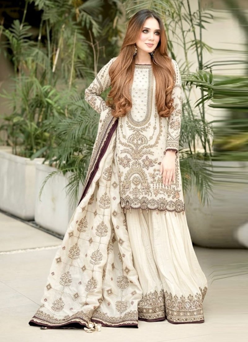 Radiant White Faux Georgette Embroidered Sequins Moti Palazzo Suit Festive Wear