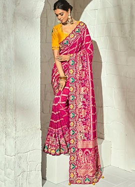 Rani Pink Georgette Bandhej Print Moti Cutdana Hand Embroidered Saree