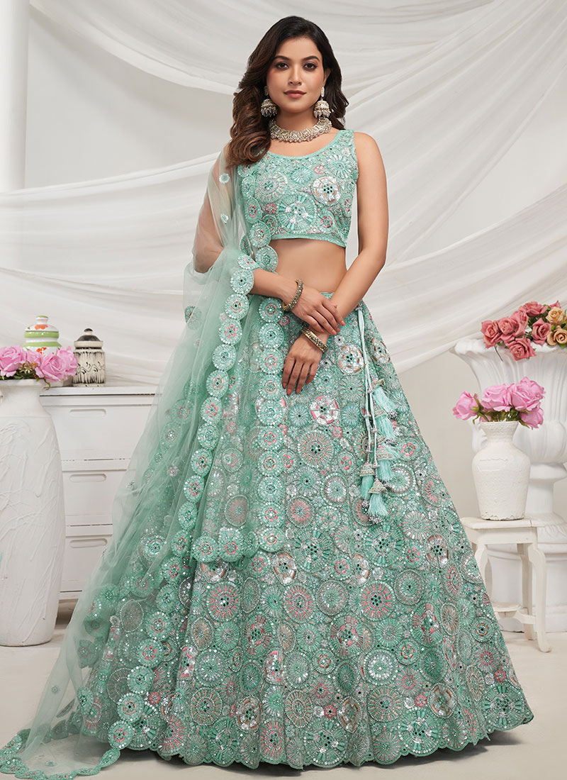 Sea Green Net Diwali A Line Lehenga Embossed With Embroidery And Sequins Wedding Wear
