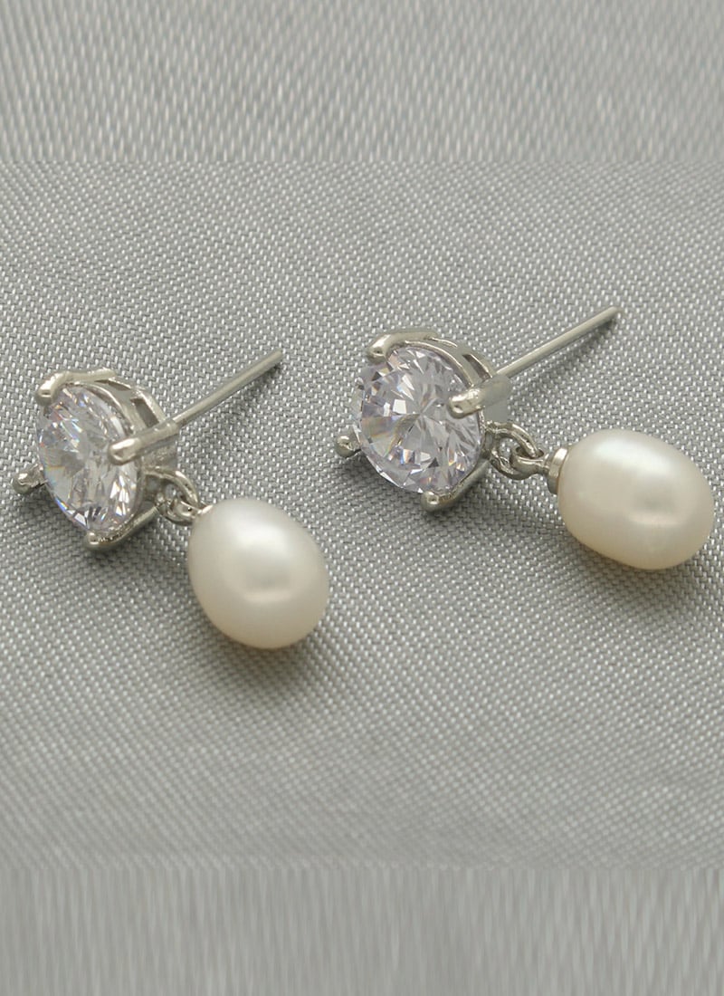 Silver Plated Pearl Stones Studs After Six Wear