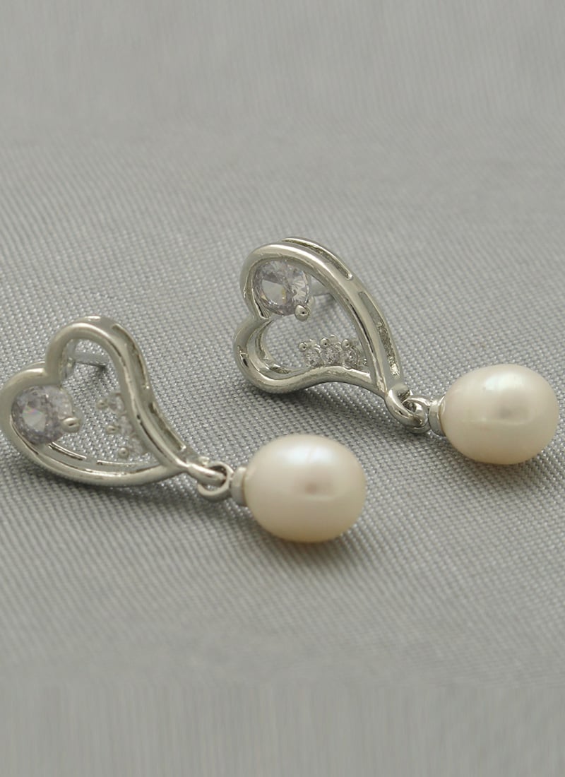 Silver Plated Pearl Stones Studs After Six Wear