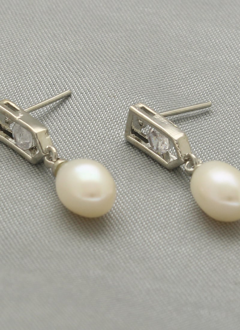Silver Plated Pearl Stones Studs After Six Wear