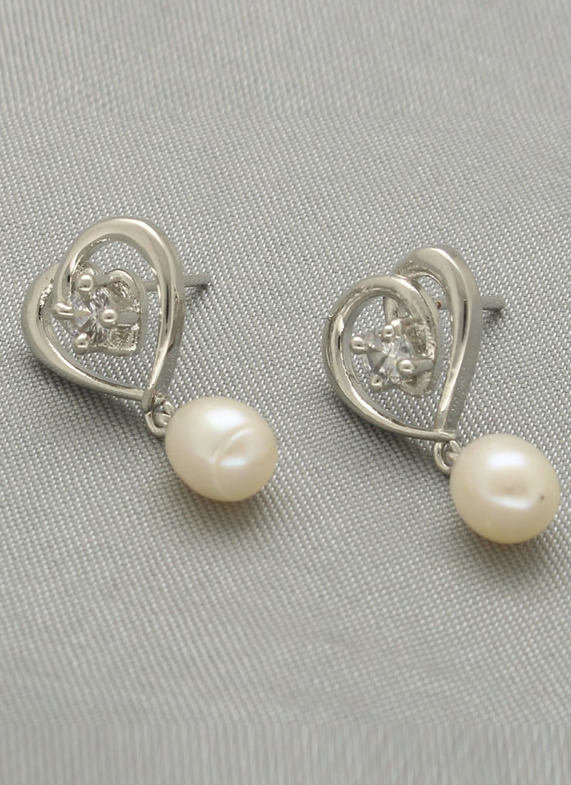 Silver Plated Pearl Stones Studs After Six Wear