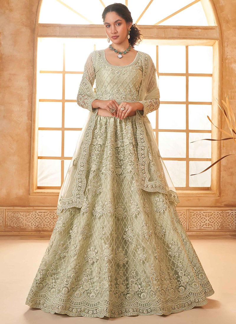 Sophisticated Charm In Pista Green Net Embroidered Stone Work Lehenga Wedding Wear