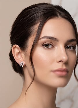 Sterling Silver Pear and Round Moissanite Floral Stud Earrings