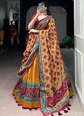 Stunning Mustard Tusser Silk Patola Print Umbrella Lehenga