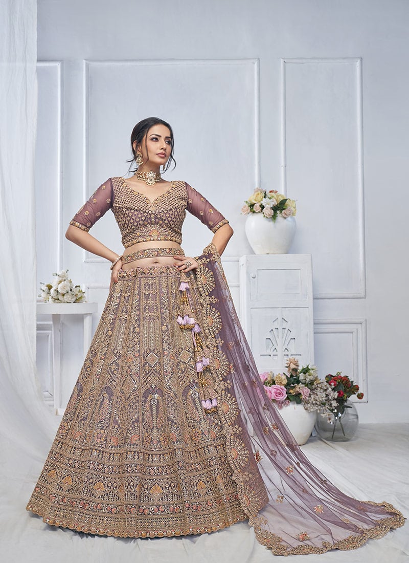 Stunning Purple Net Zarkan Work Zari Embroidered And Stone Sequins Lehenga Wedding Wear