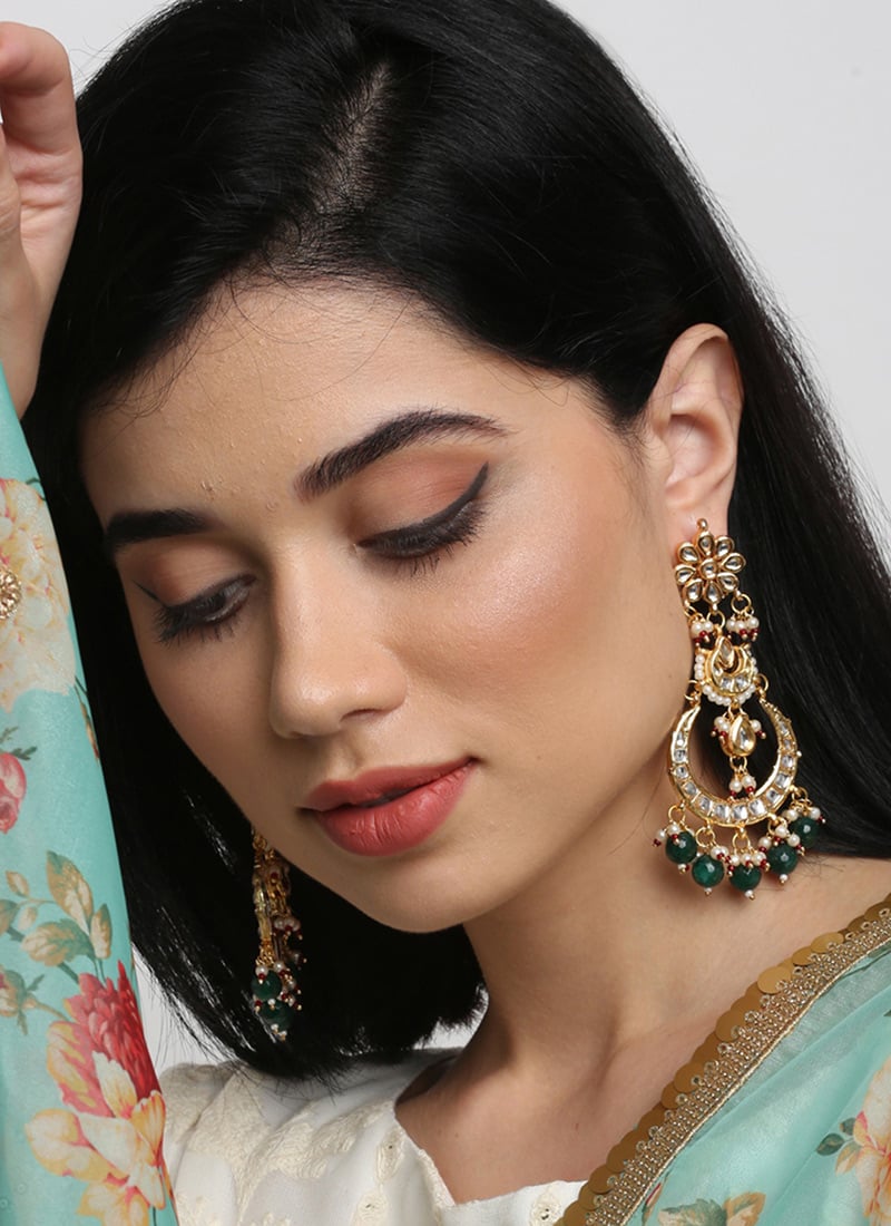 Timeless Gold Plated Kundan Earrings With White Stones And Green Pearls Party Wear