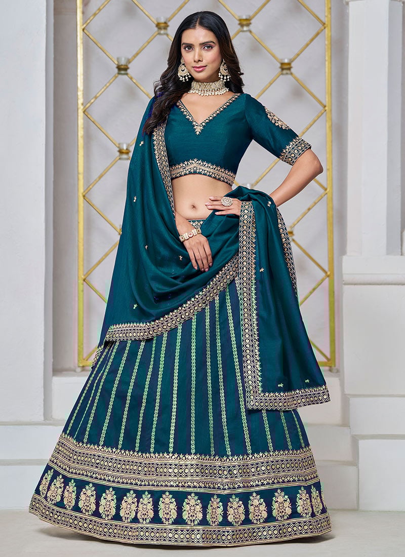 Whimsical Beauty In Teal Blue Silk Embroidered Sequins Lehenga Wedding Wear