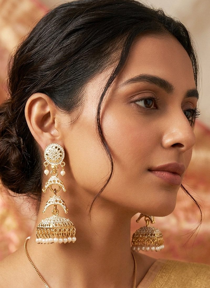 White Gold Plated Enamelled DomeShaped Jhumka Earrings After Six Wear