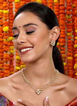 White Gold Plated Kundan And Pearl Work Elegant Necklace