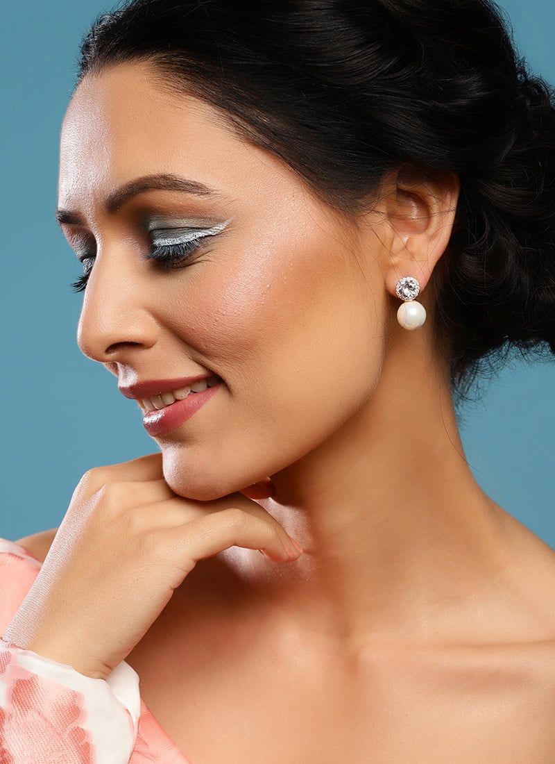 White Moti And Kundan Adorned Studs Festive Wear