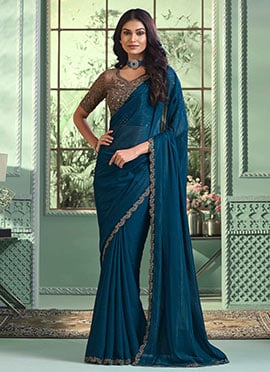 Women Saree In Teal Blue Faux Georgette Embroidered Sequins Border