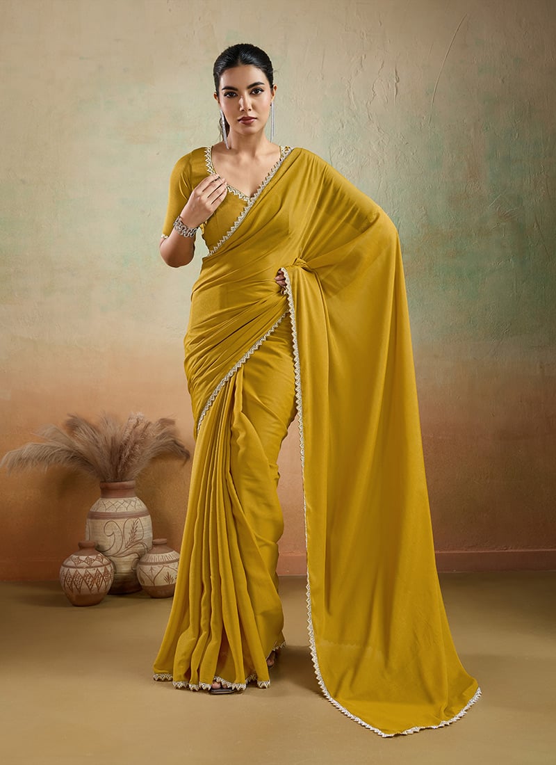 Yellow Faux Georgette Saree With Stones Lace Detailing