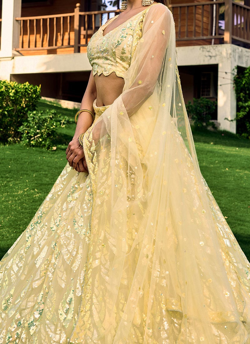 Amla Off-White Tissue Silk Sequins Thread Work Lehenga Choli with Orange Bandhej Dupatta