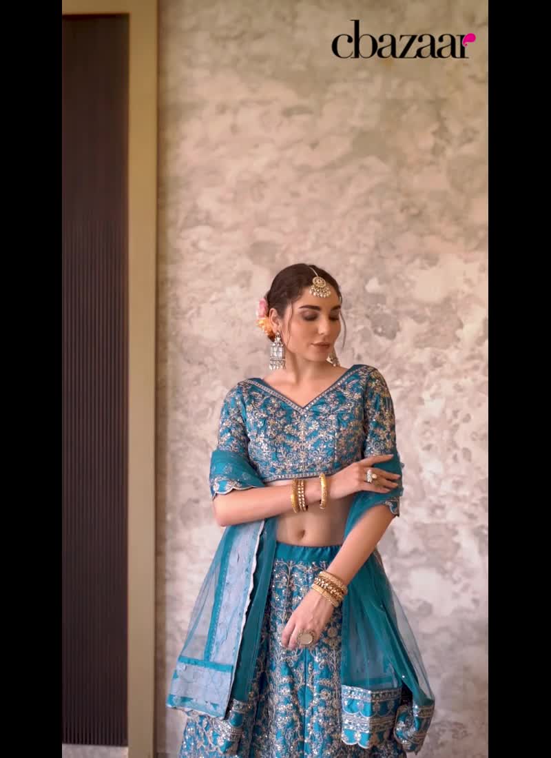 Blue Silk Embroidered Sequins Ravishing Lehenga Wedding Wear