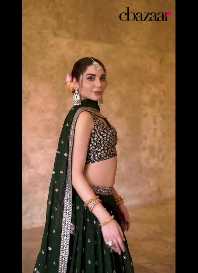 Dark Green Faux Georgette Zari Embroidered Sequins Ravishing Lehenga Wedding Wear