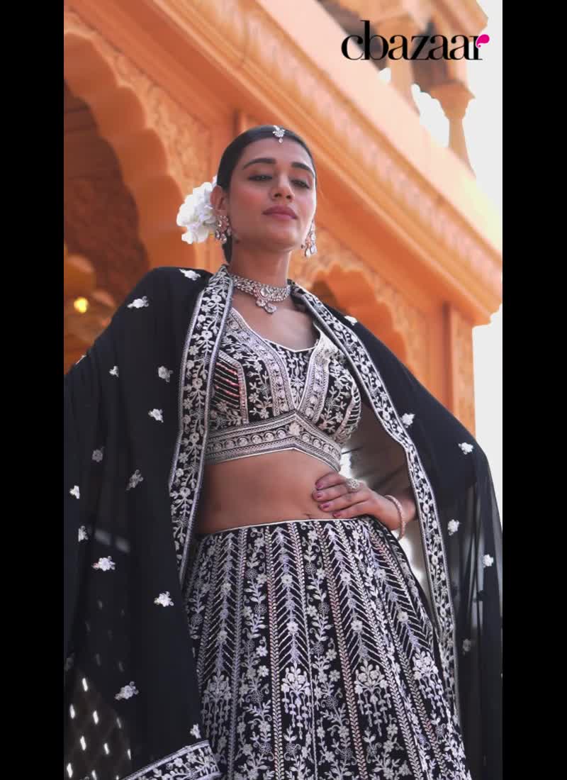 Glamorous Black Faux Georgette Lehenga Featuring Embroidery And Sequins Wedding Wear