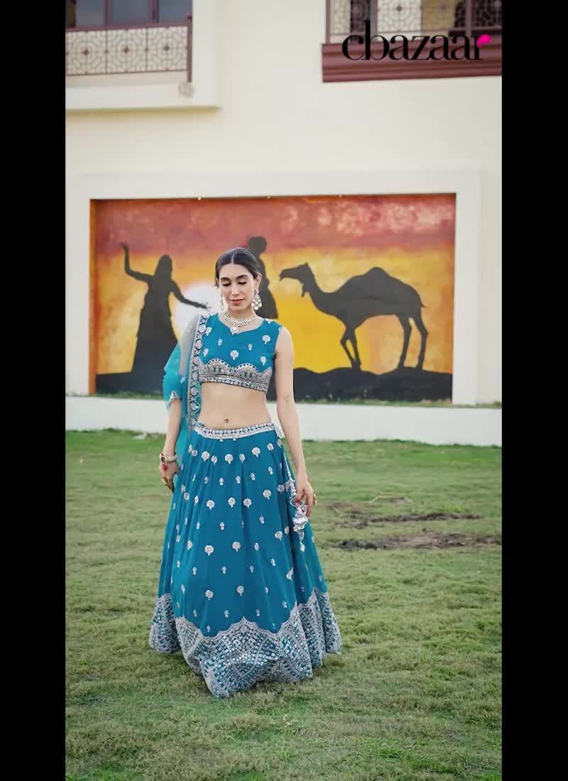 Regal Teal Blue Faux Georgette Zari Embroidered Sequins Lehenga Wedding Wear
